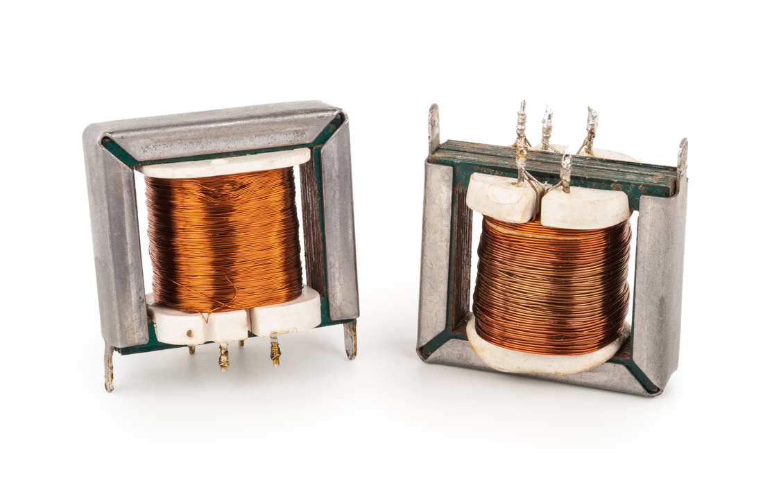 Transformers for efficient power distribution and transmission. Essential equipment for electrical infrastructure. Image depicts electrical transformers.